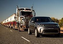 Land Rover Discovery mit Road Train im Schlepp.  Foto: Auto-Medienportal.Net/Land Rover